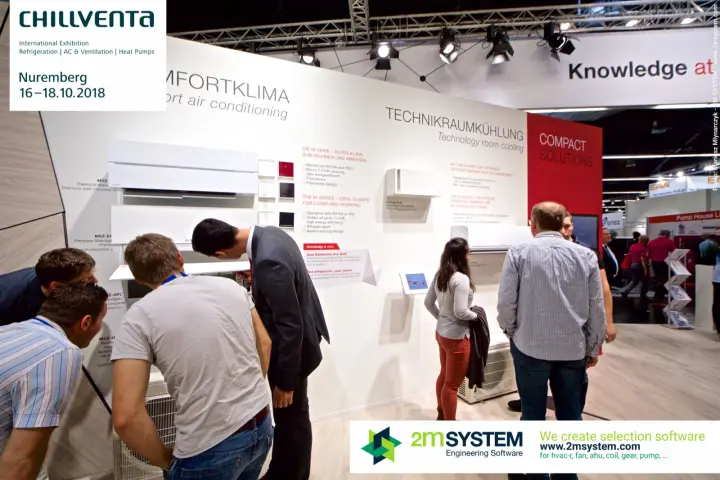 Visitors inspect M-Series split units at Mitsubishi Electric