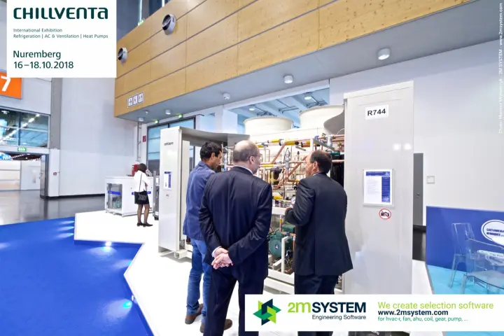 Visitors inspecting a Centauro R744 CO2 refrigeration rack