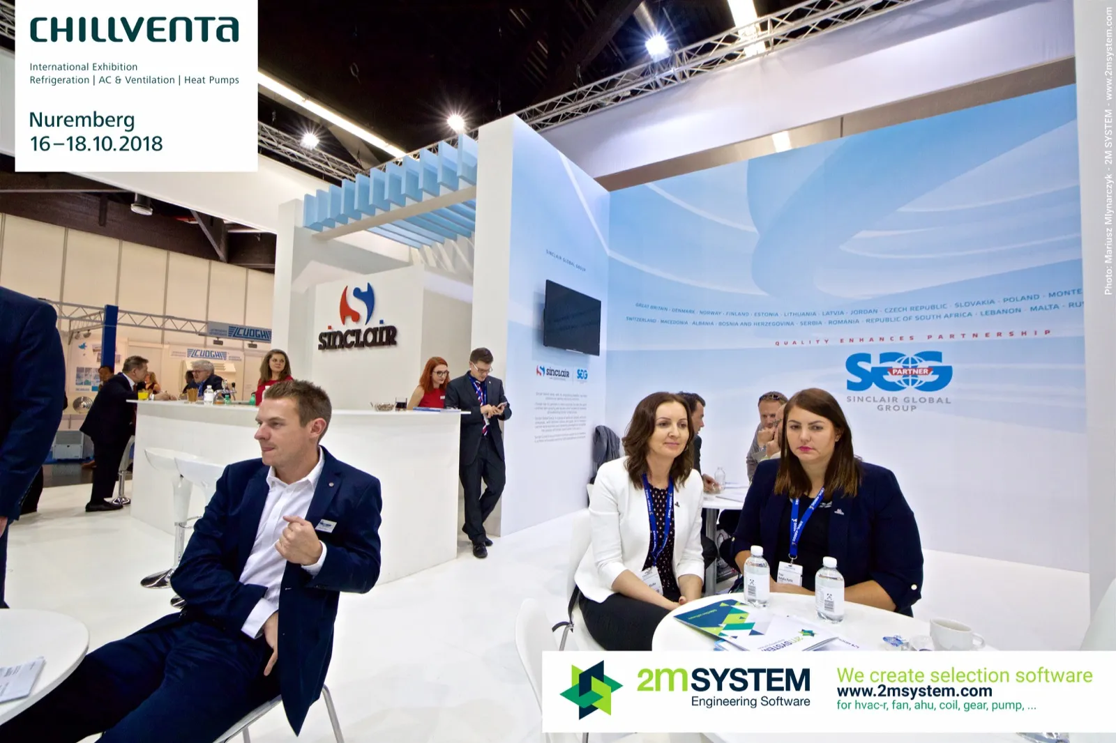 Visitors seated in the Sinclair lounge in front of the SGG partner wall at Chillventa 2018