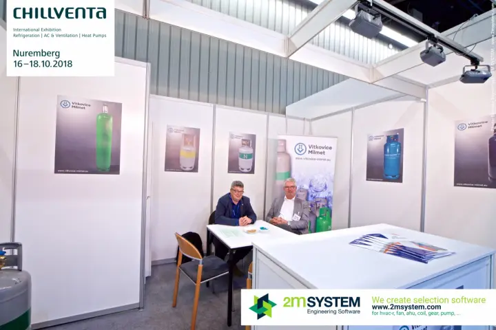 Vitkovice Milmet shell-scheme stand with gas cylinder posters