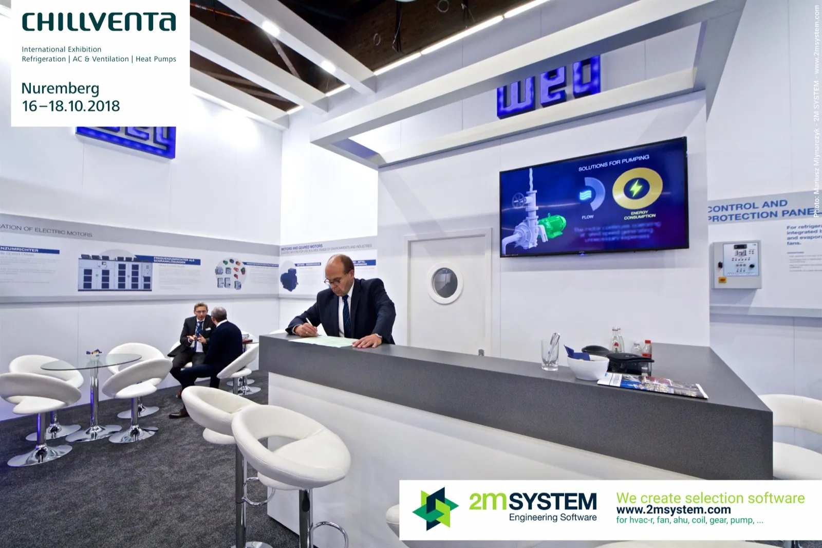 WEG reception counter with a pumping solutions video and lounge seating at Chillventa 2018