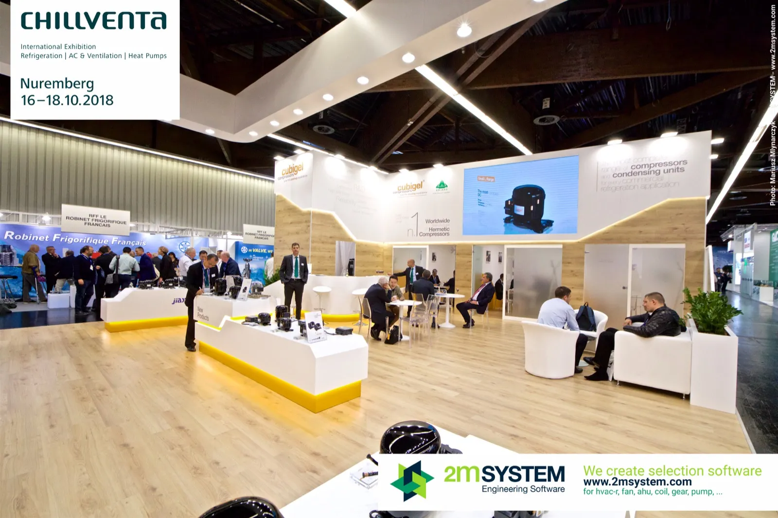Wide view of the Cubigel stand with lounge armchairs and video wall at Chillventa 2018