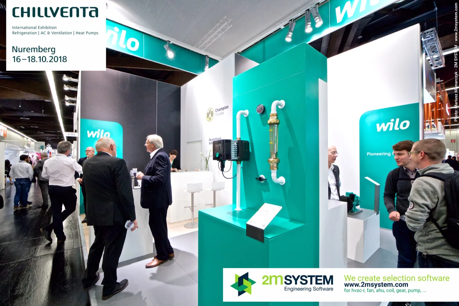 Wilo stand with circulator pump and flow meter on a teal column at Chillventa 2018