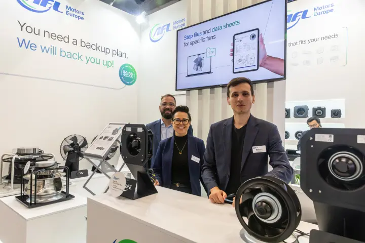AFL Motors Europe staff with EC fans and a "Step files and data sheets" screen at Chillventa 2026