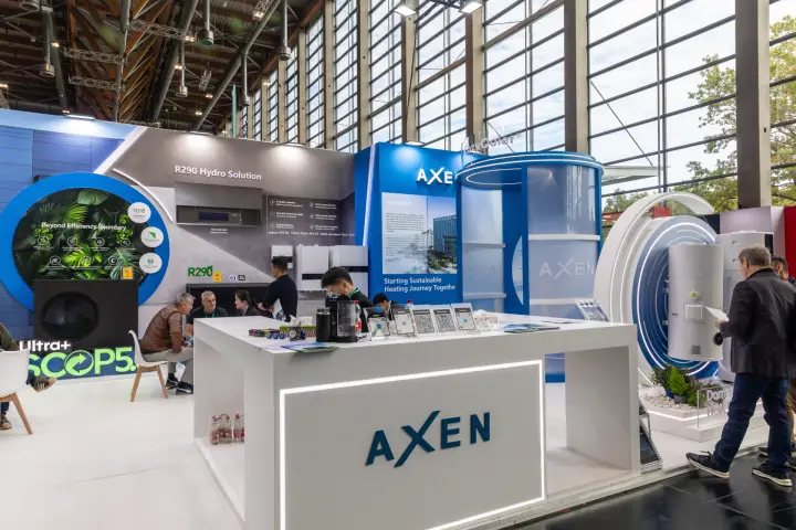 Axen reception counter with QR codes and R290 hydro units at Chillventa 2026