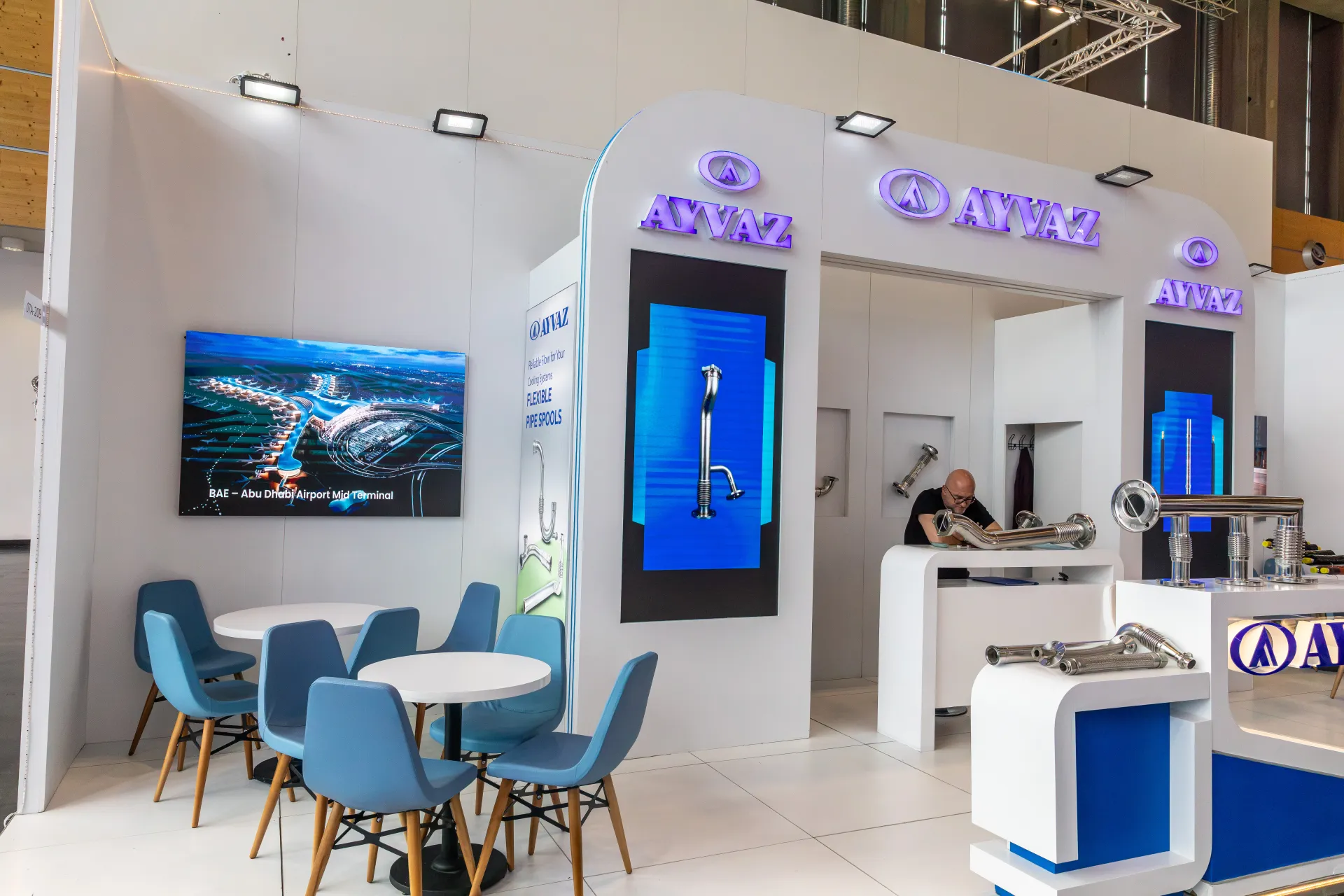 Ayvaz stand with flexible pipe spools and meeting tables at Chillventa 2026