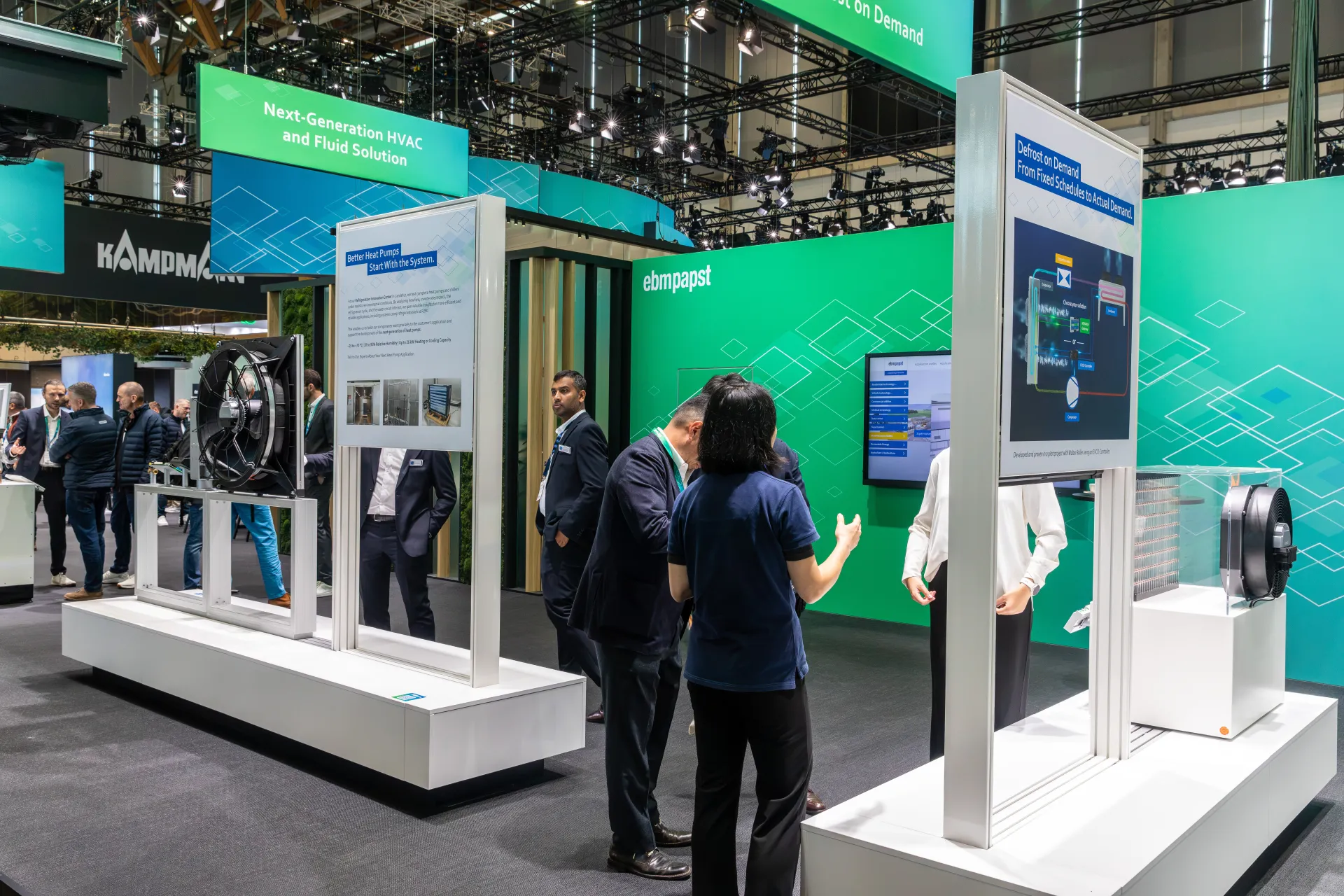 ebm-papst heat pump and defrost displays under a green wall at Chillventa 2026