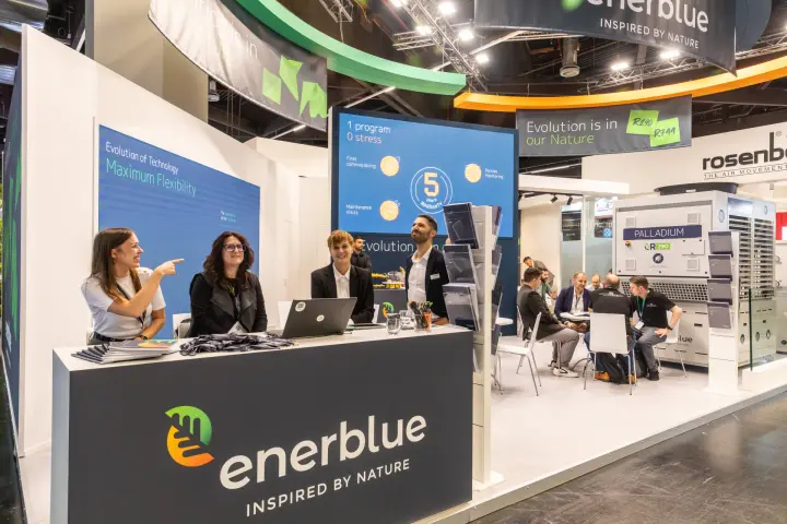 Enerblue stand with R290 Palladium unit and "Evolution is in our Nature" banner