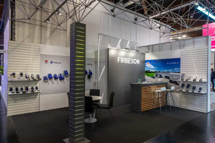 Firbeson stand with rows of blue actuators on slatted walls at Chillventa 2026