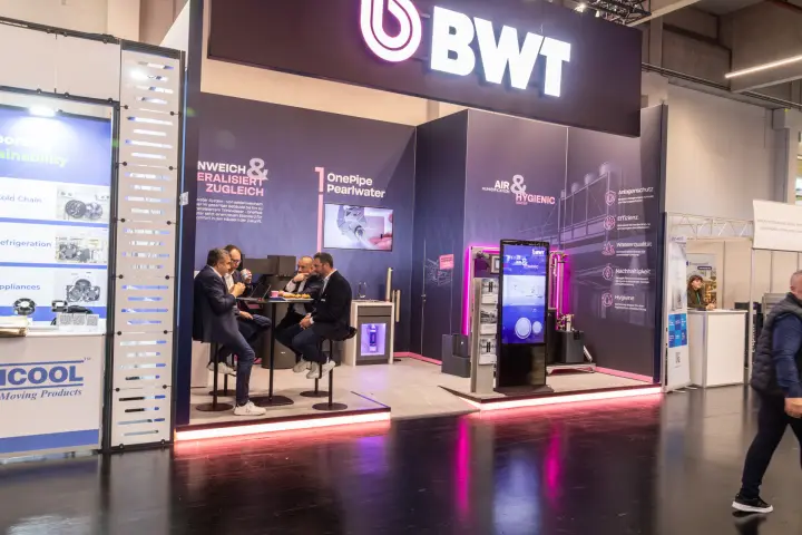 Front view of the BWT stand under its illuminated logo at Chillventa 2026