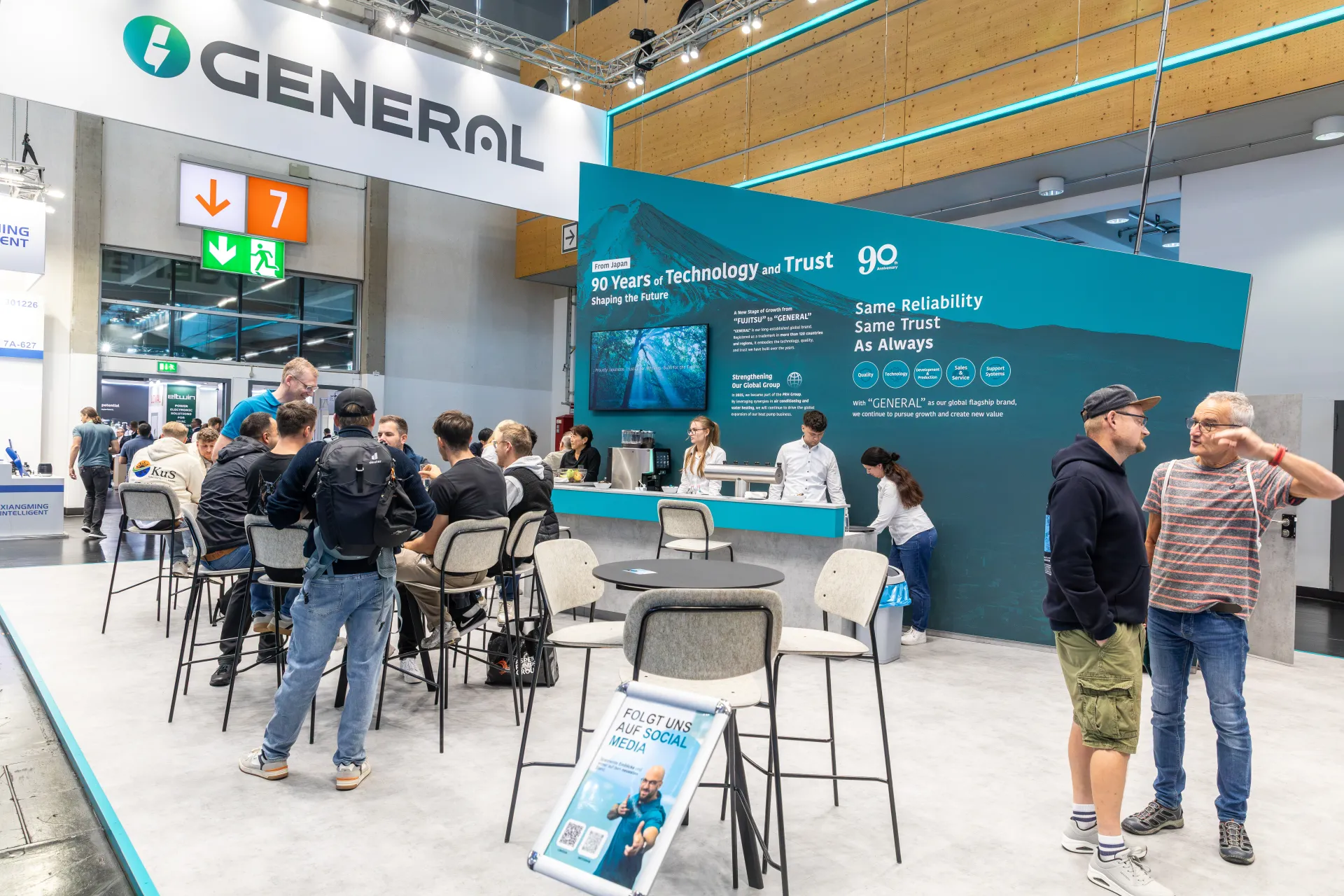 General stand bar and lounge under the "90 Years of Technology and Trust" wall at Chillventa 2026