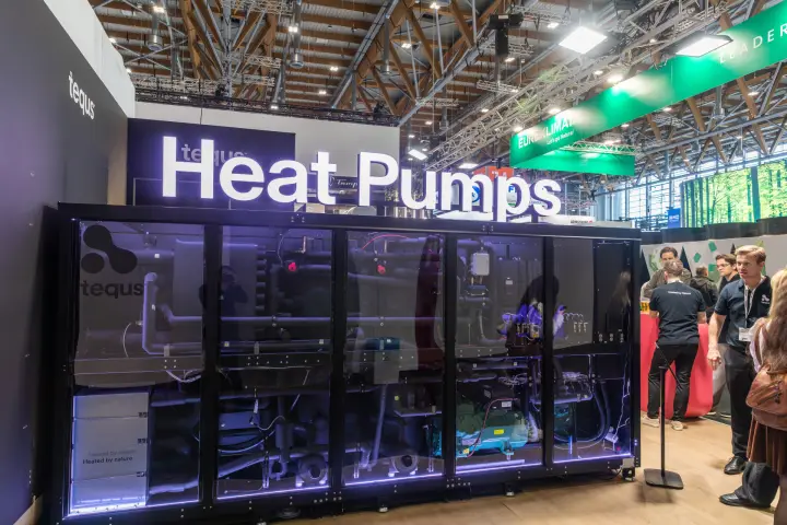 Glass-fronted Tequs heat pump under an illuminated "Heat Pumps" sign at Chillventa 2026