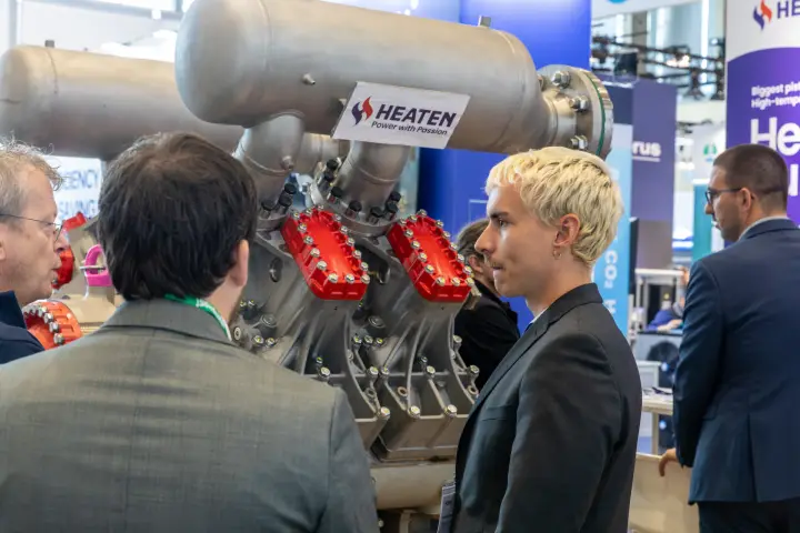 Heaten piston compressor with red cylinder covers drawing visitors at Chillventa 2026