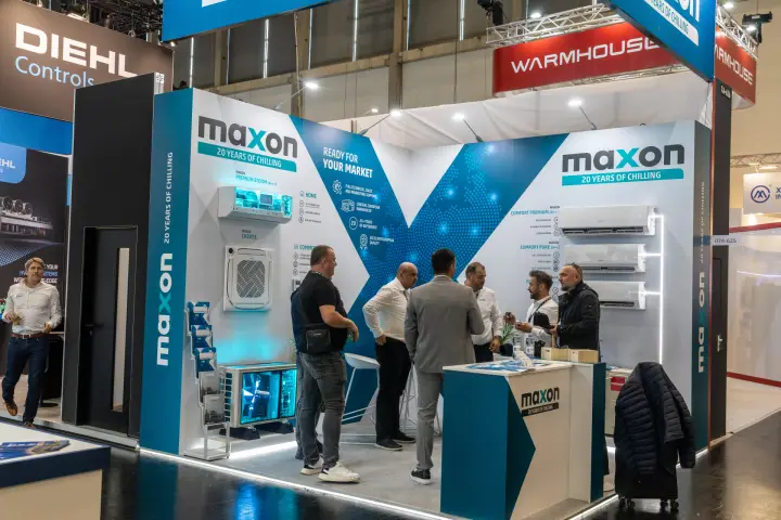 Maxon stand marking "20 Years of Chilling" with wall-mounted split units at Chillventa 2026