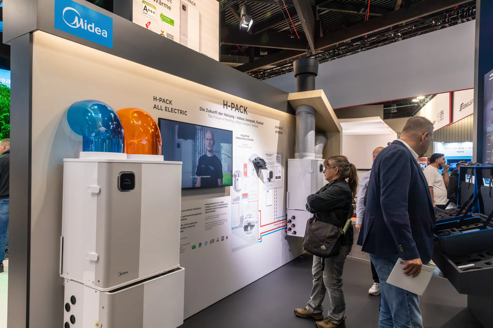 Midea H-Pack indoor heat pump display with installation diagram at Chillventa 2026