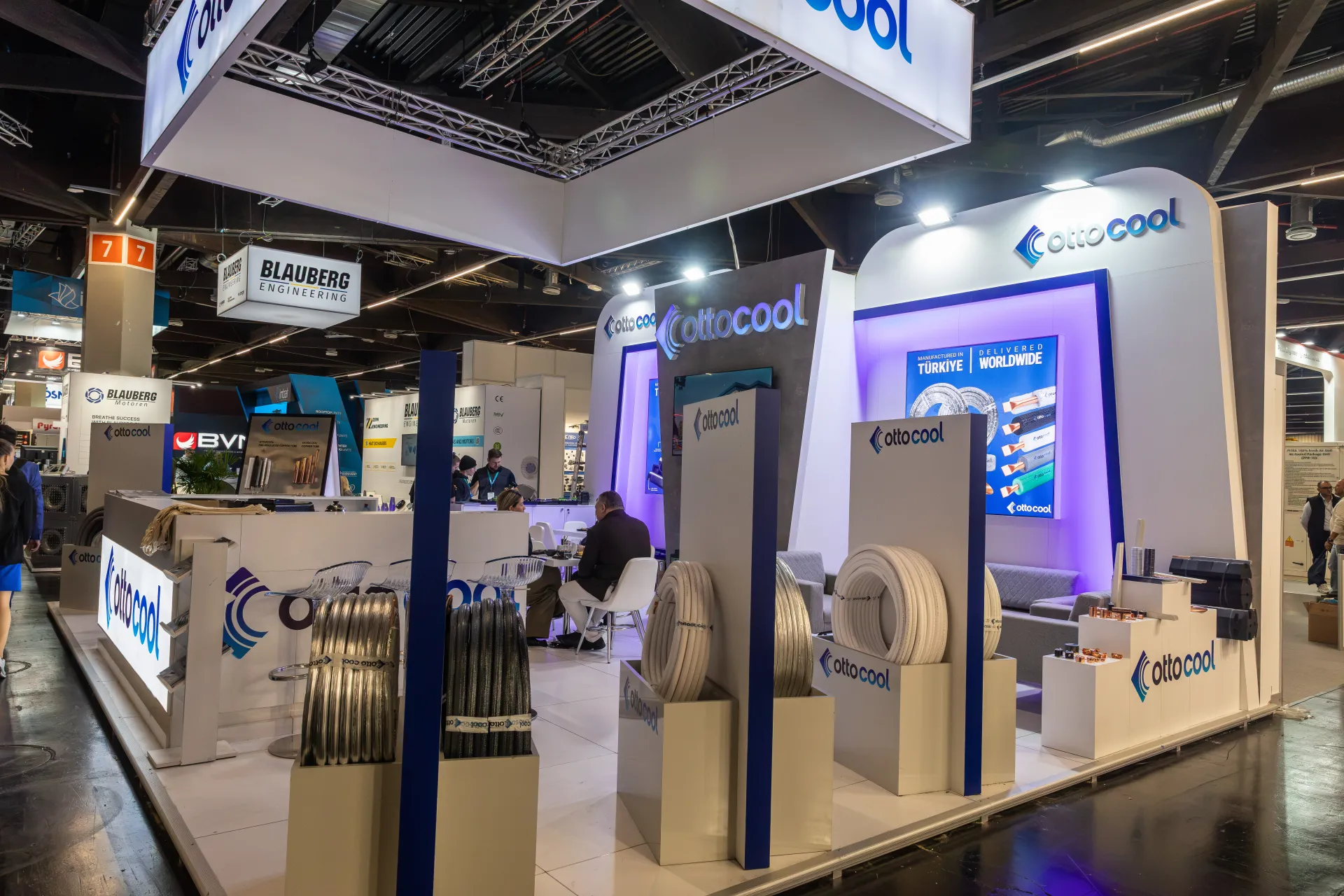 Ottocool stand with coils of insulated copper pipe on white plinths at Chillventa 2026