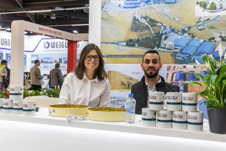 Petra hosts at the counter in front of their headquarters photo at Chillventa 2026