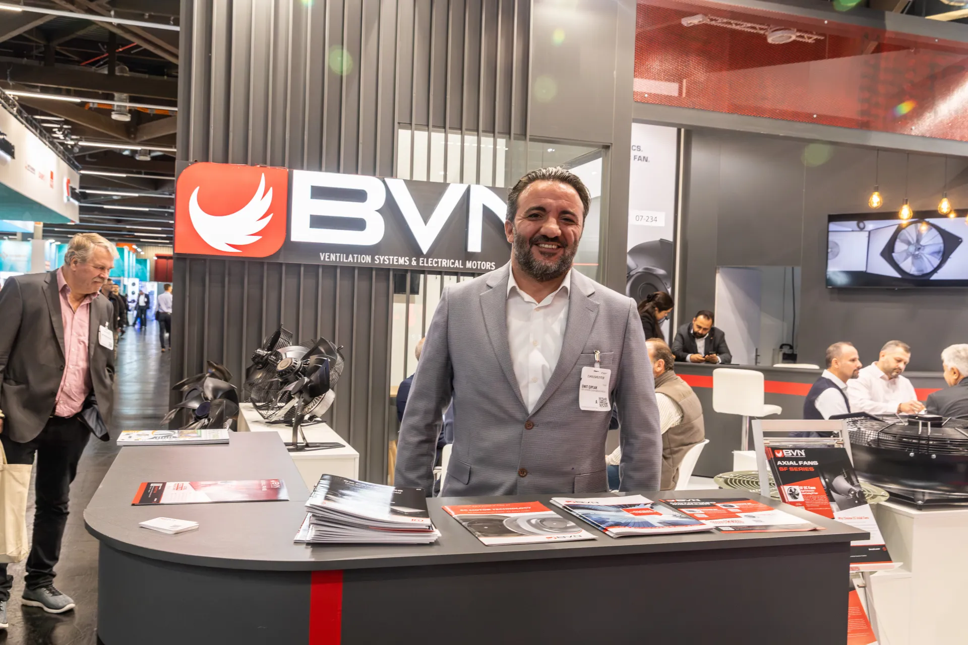 Portrait at the BVN counter with axial fans and the meeting area behind at Chillventa 2026