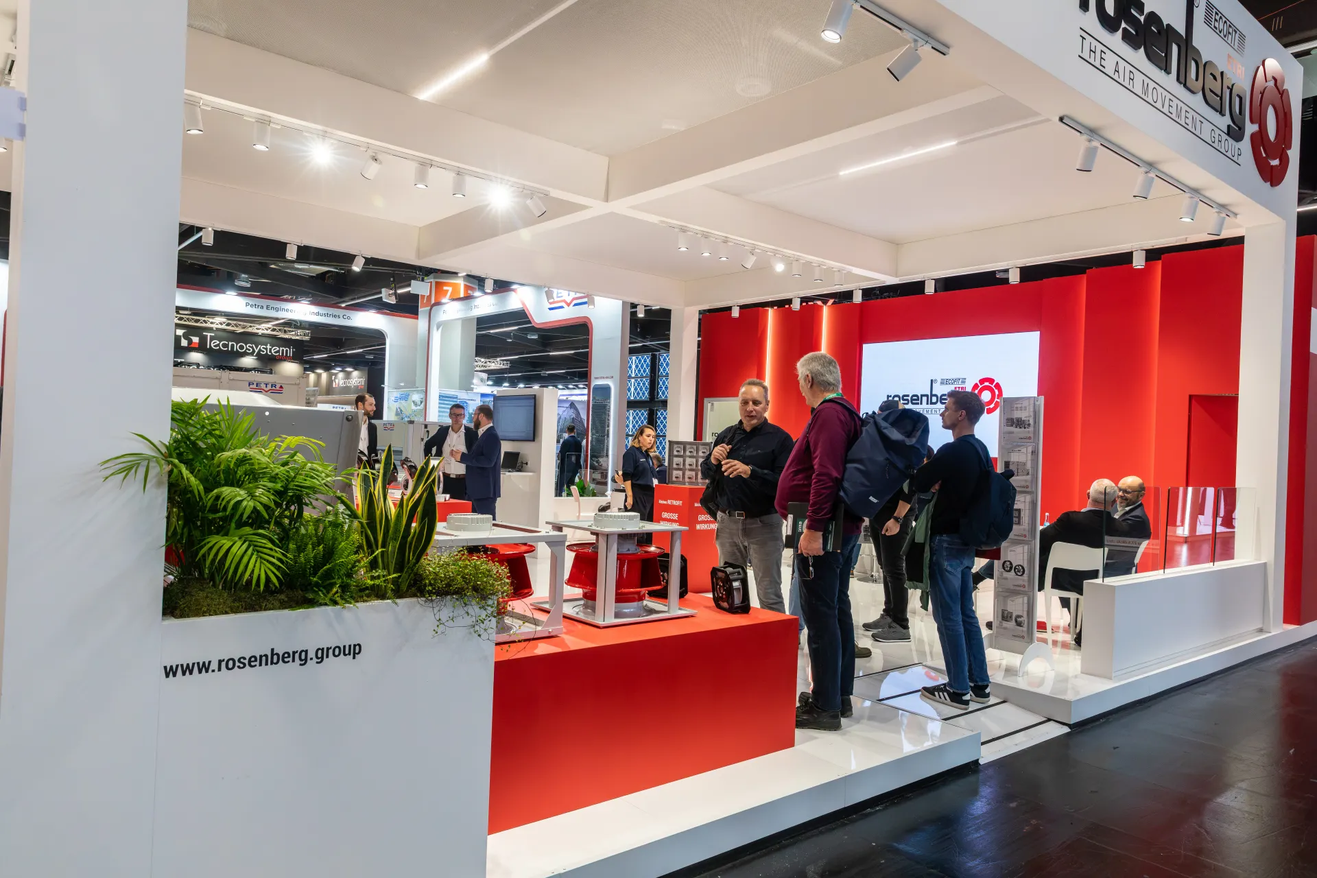 Rosenberg stand corner with red radial fan impellers and a brochure rack at Chillventa 2026