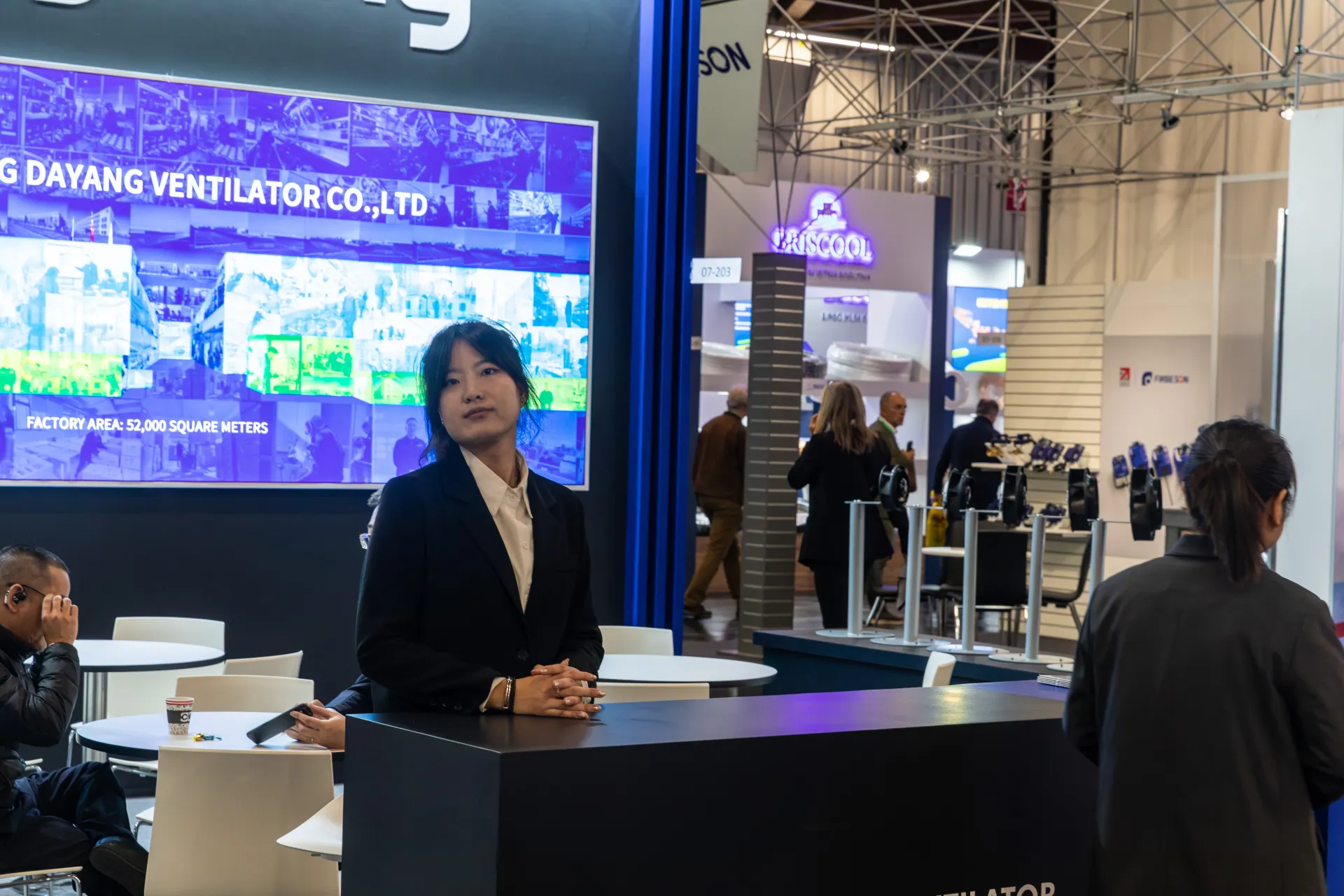 Staff at the Bayoung Ventilator counter in front of the factory photo panel at Chillventa 2026