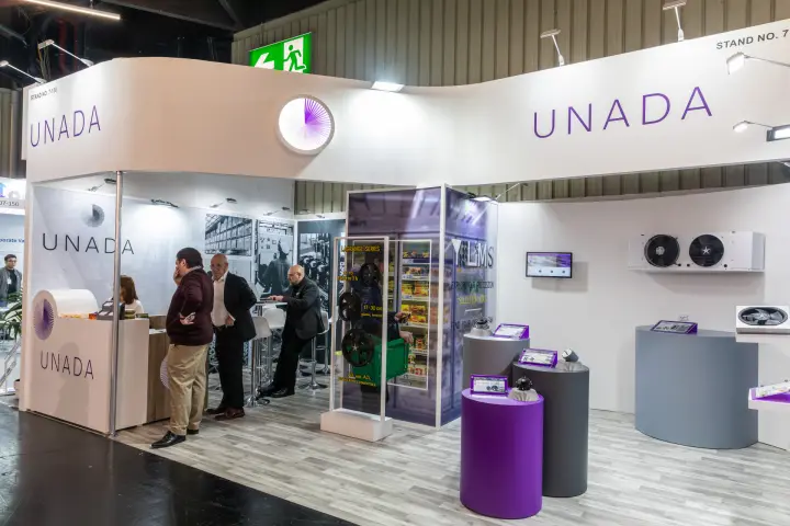Unada stand with refrigeration fans on purple and grey plinths