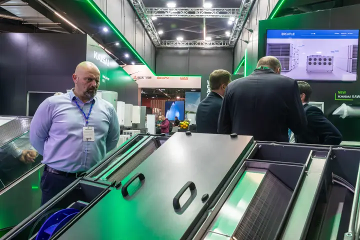 Ventilation unit with removed lids showing plate exchanger and plug fan at Chillventa 2026