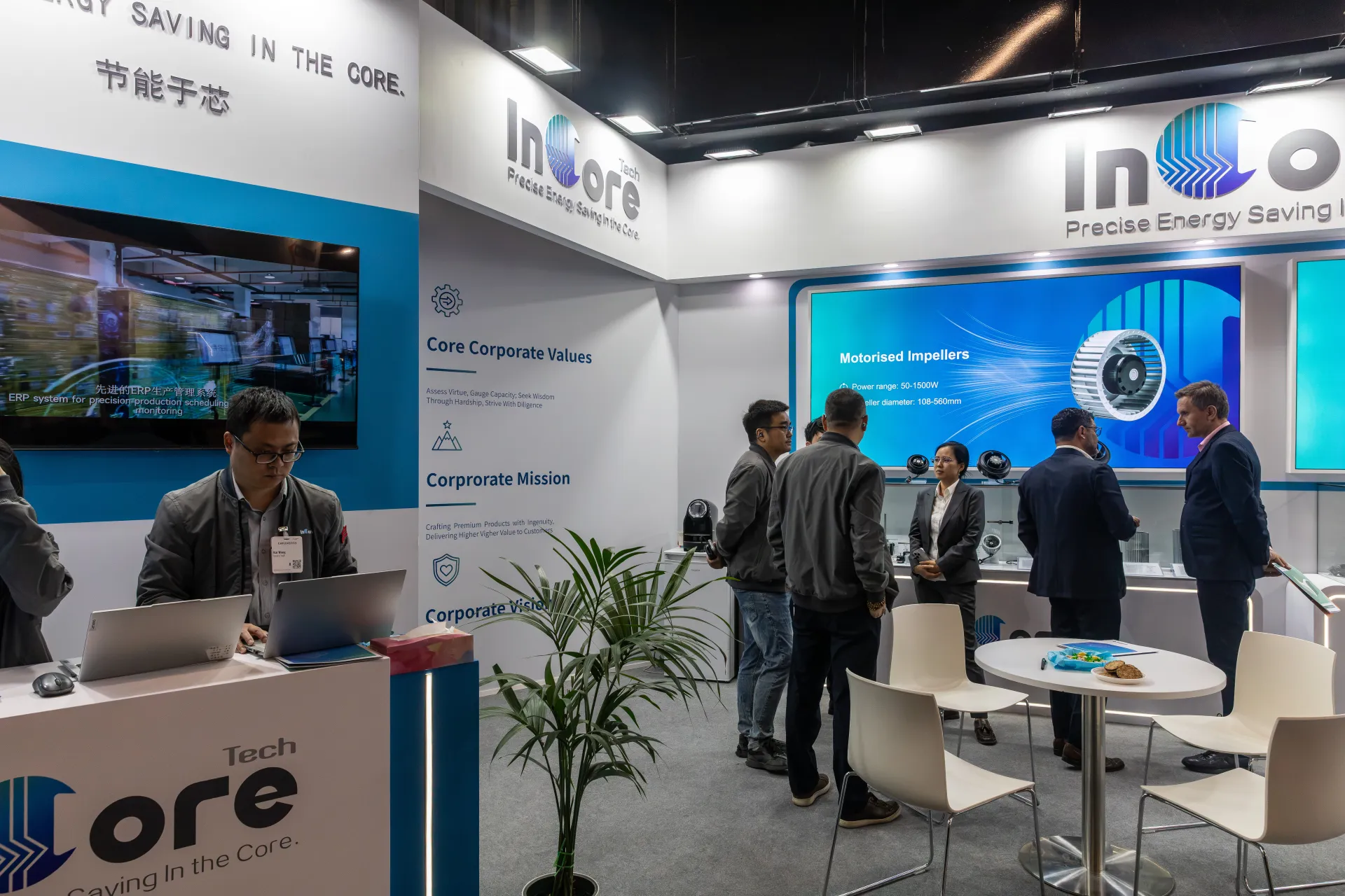 Visitors in talks beside the InCore Tech motorised impeller display at Chillventa 2026