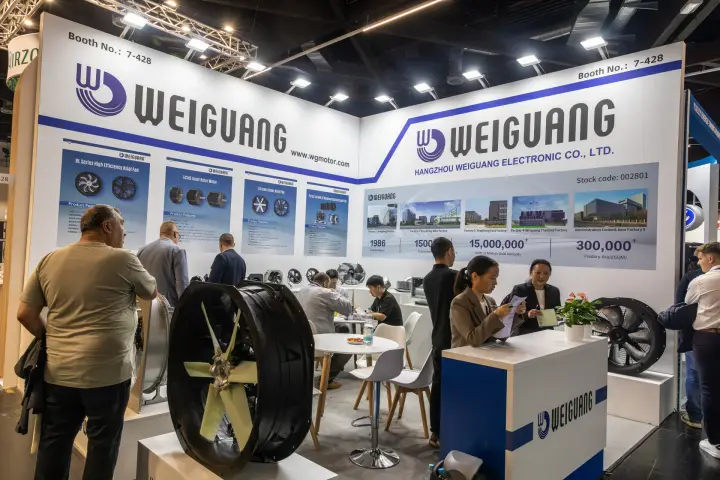 Weiguang booth 7-428 with axial fans and visitors at the counter at Chillventa 2026