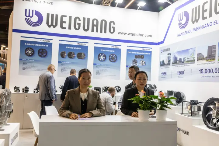 Weiguang team at the reception desk in front of product posters at Chillventa 2026