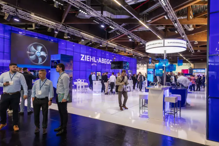 Wide view of the busy Ziehl-Abegg stand with "Quiet Operation" fan video