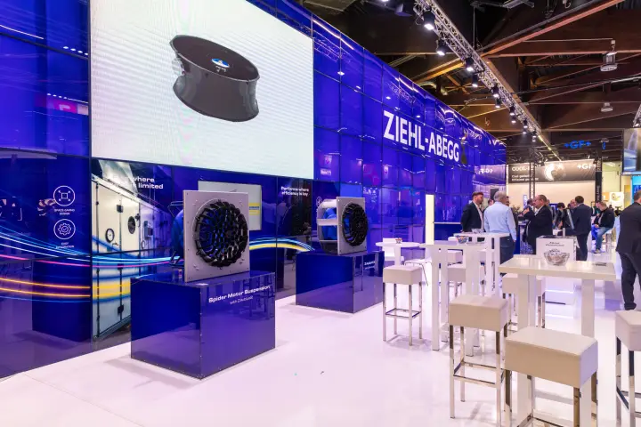 Ziehl-Abegg fans on blue plinths beside a large LED fan image