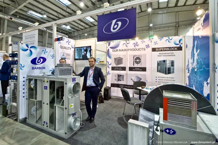Barbor stand with heat exchangers and an "OUR MAIN PRODUCTS" wall at Forum Wentylacja 2016