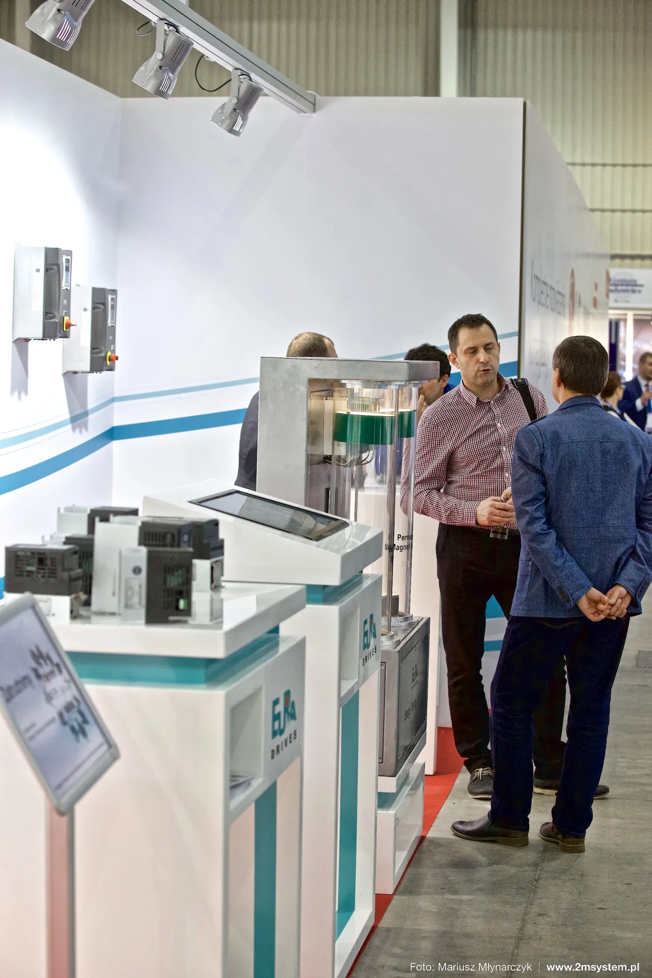 Eura Drives frequency inverters on white and turquoise plinths at Forum Wentylacja 2016