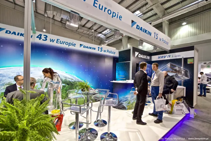 Inside the Daikin stand: bar stools, Earth backdrop and VRV IV i-series panel at Forum Wentylacja 2016