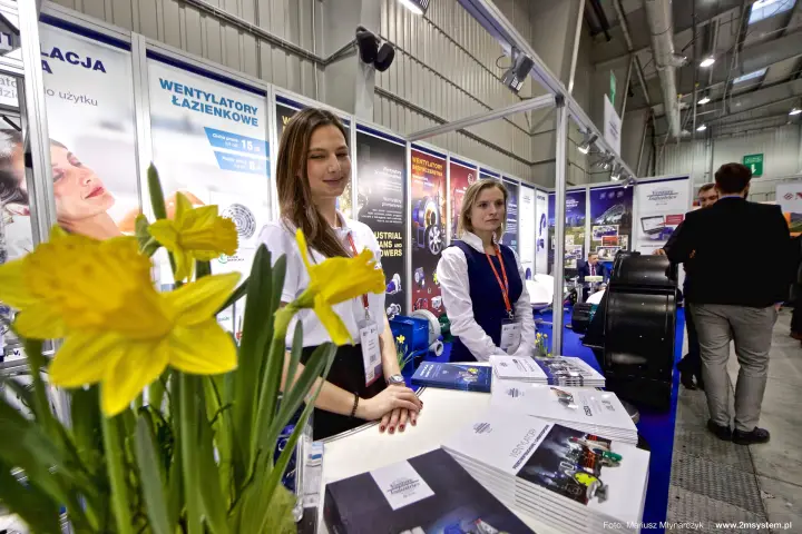 Venture Industries reception counter seen through daffodils