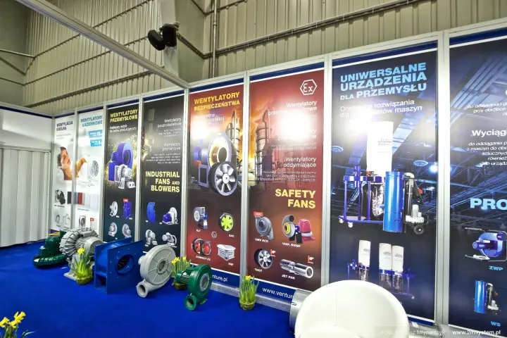 Venture Industries wall of fan posters with blowers on the blue carpet at Forum Wentylacja 2016