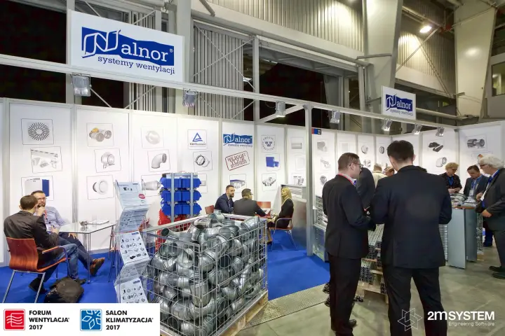 Alnor "systemy wentylacji" stand with a cage full of galvanised duct bends at Forum Wentylacja 2017
