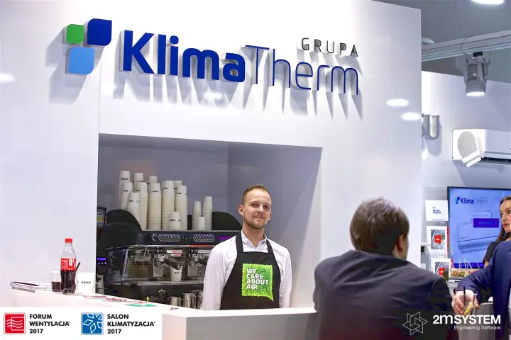 Barista serving at the Klima-Therm coffee bar