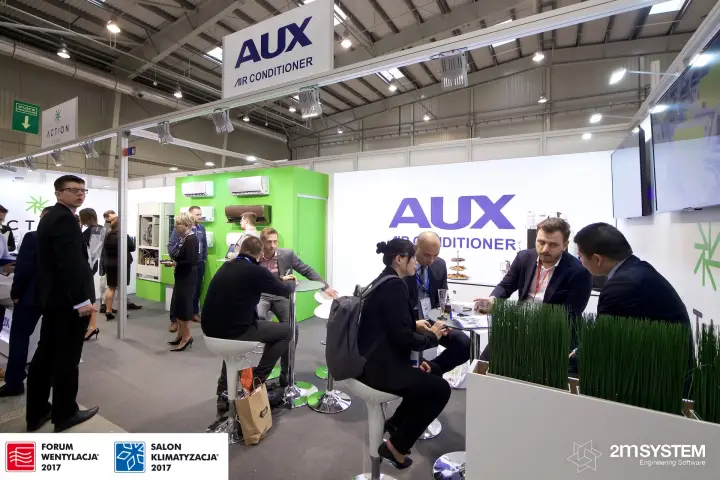 Business meetings at high tables on the AUX Air Conditioner stand at Forum Wentylacja 2017