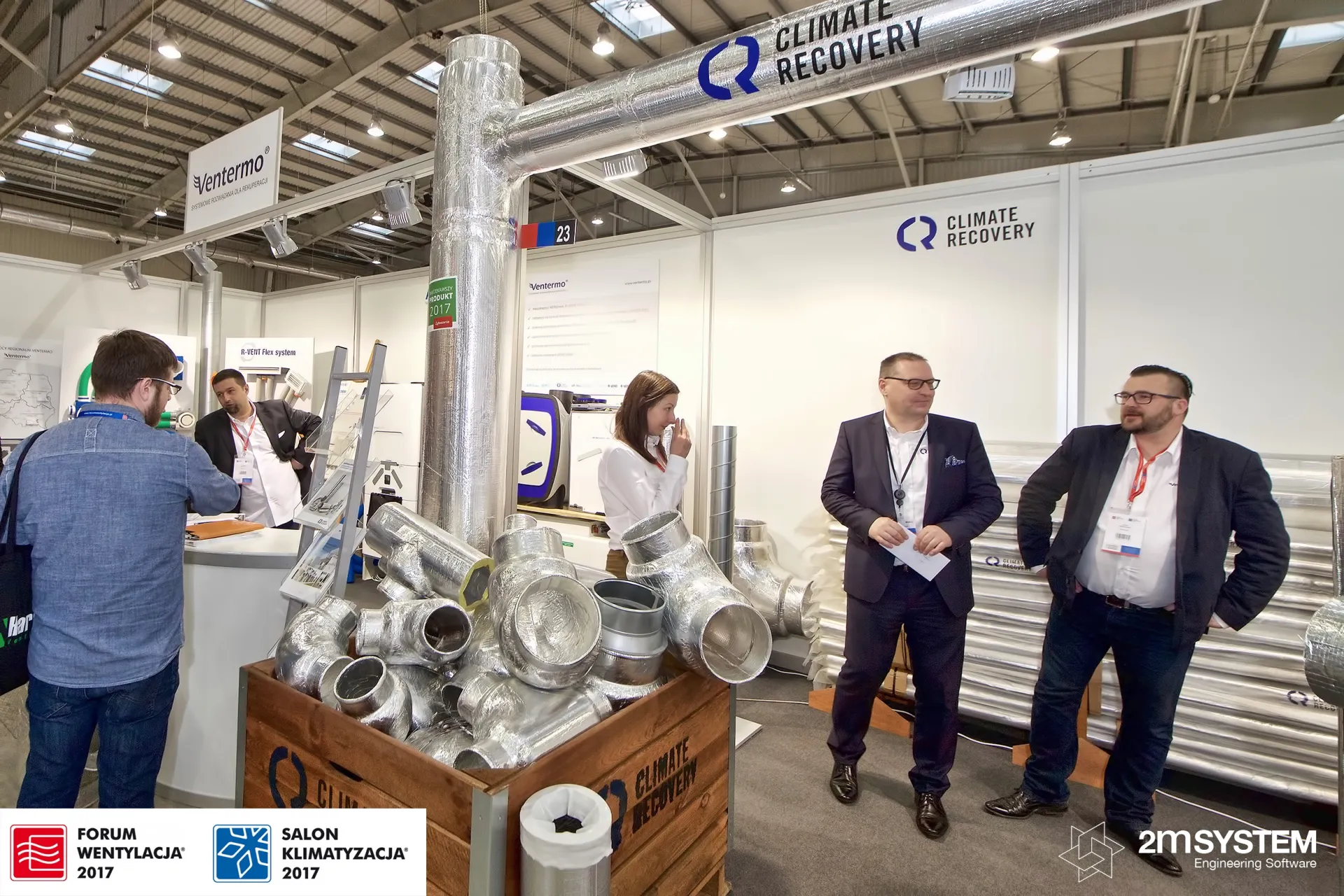 Climate Recovery insulated ducts in a wooden crate and overhead duct run at Forum Wentylacja 2017