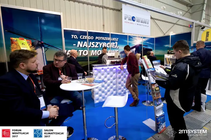 Coffee bar and meeting tables at the Prowent stand