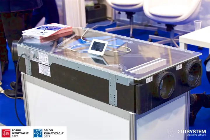 Compact heat recovery unit with glass top and wall controller on display at Forum Wentylacja 2017