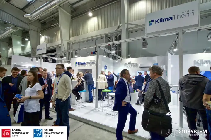 Crowded aisle in front of the large white Klima-Therm stand at Forum Wentylacja 2017