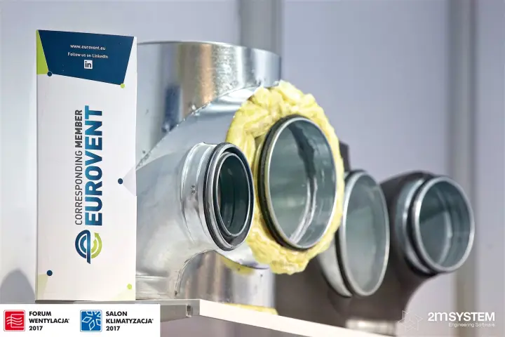 Galvanised duct fittings with insulation next to a Eurovent member leaflet