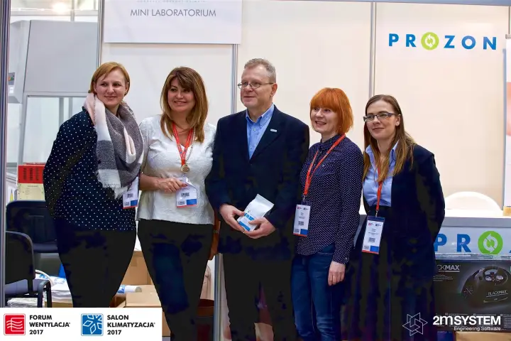 Group photo at the Prozon stand beside the Mini Laboratorium sign at Forum Wentylacja 2017