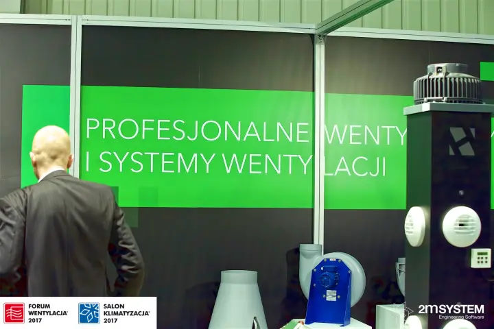 Harmann stand with green slogan wall and roof fan on a display column at Forum Wentylacja 2017