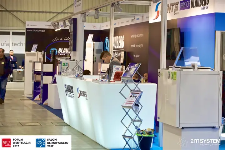 Illuminated Blauberg and Vents reception counter along the aisle at Forum Wentylacja 2017