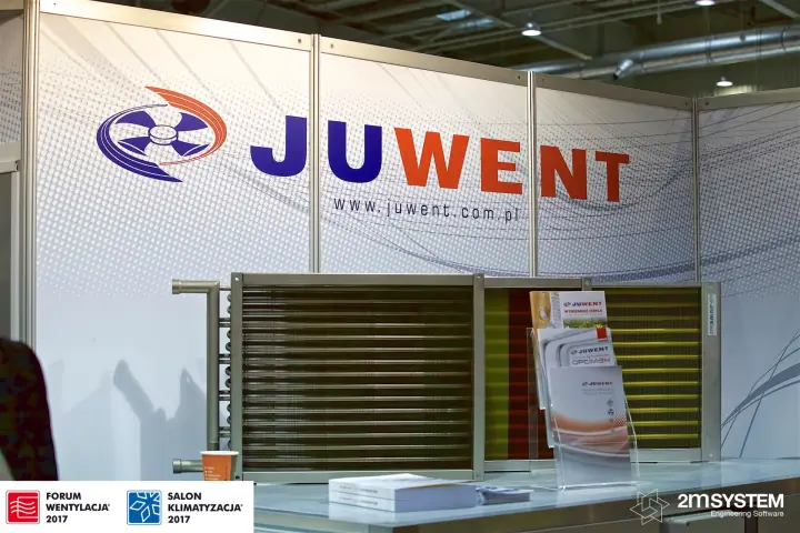 Juwent finned heat exchanger coils in front of the logo wall