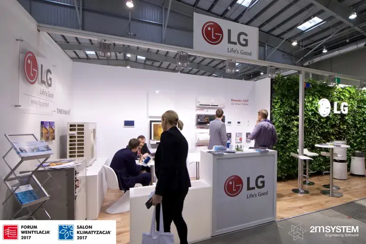LG stand front with reception counter and green plant wall at Forum Wentylacja 2017