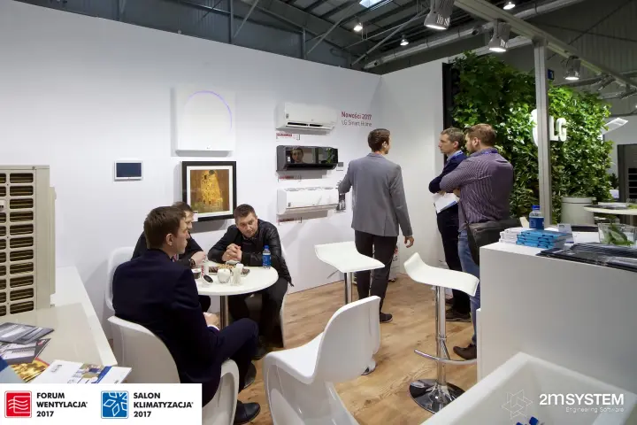 LG stand with wall-mounted air conditioners and meeting table at Forum Wentylacja 2017